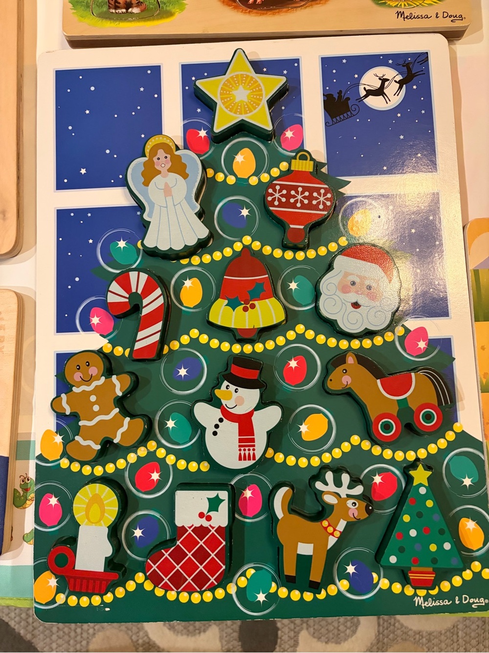 Melissa & Doug Green Christmas Tree Peg Puzzle with Multicolored Holiday Pieces